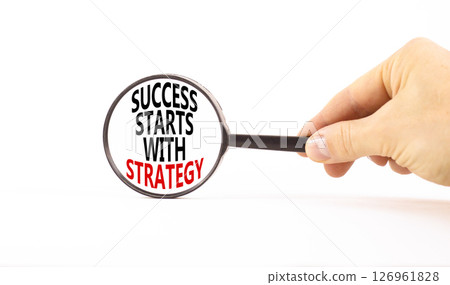 Success starts with strategy symbol. Concept words Success starts with strategy on beautiful magnifying glass. Beautiful white background. Business and success starts with strategy concept. Copy space 126961828