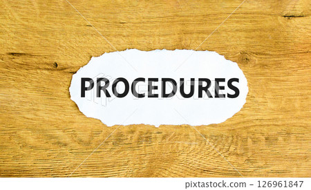 Procedures symbol. Concept word Procedures on beautiful white paper. Beautiful wooden wall background. Business procedures concept. Copy space. 126961847
