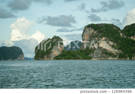 Beautiful view of green islands and sky on the sea 126964396
