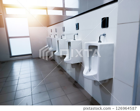 Urinals in men's restrooms, toilets Urinals in men's restrooms, toilets 126964587