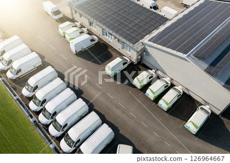 Electric delivery vans hub. Fleet of electric vehicles Electric delivery vans hub. Fleet of electric vehicles 126964667