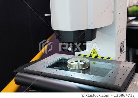 Optic machine for precise measurement of part size and quality evaluation. Smart factory. 126964732