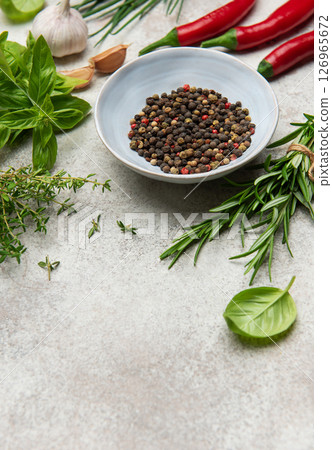 Fresh herbs and spices creating culinary masterpiece on table Fresh herbs and spices creating culinary masterpiece on table 126965672