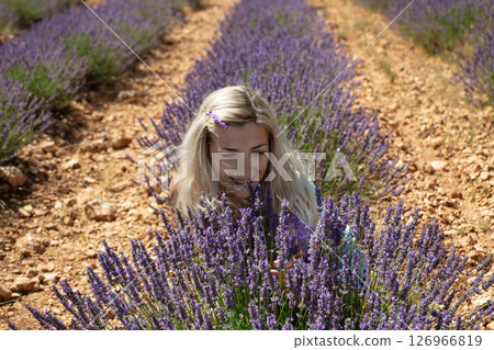 Beautiful girl at a lavender field in Provence 126966819