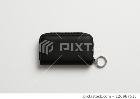 A simple black key case placed on a white background 126967515