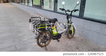 Moscow, Russia 09 10 2024 Bicycle and scooter parking for delivery 126967523