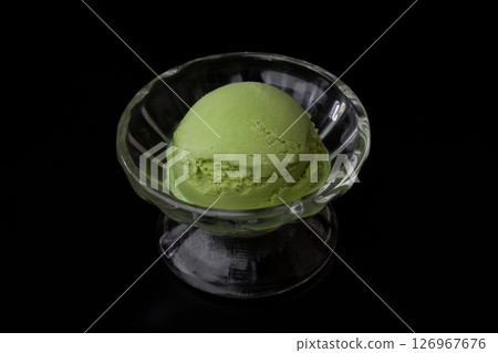 Matcha ice cream in a glass bowl Matcha ice cream in a glass bowl 126967676