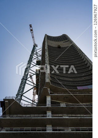 The construction of a skyscraper. Construction of a tall building 126967927
