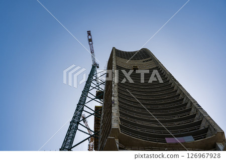 The construction of a skyscraper in Batumi. Construction of a tall building The construction of a skyscraper in Batumi. Construction of a tall building 126967928
