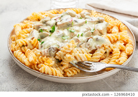 fusilli pasta, with champignons, in creamy garlic sauce, with herbs and spices, sauce, no people, 126968410