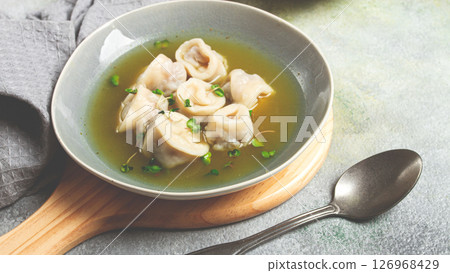 Cappelletti with meat in chicken broth, ravioli with meat, homemade, no people, 126968429