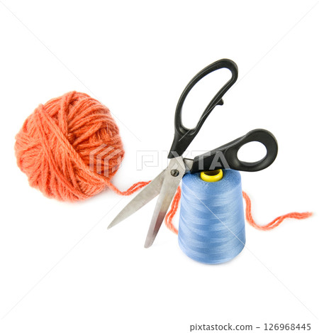 Ball of yarn, scissors and a spool of sewing thread isolated on white background. 126968445