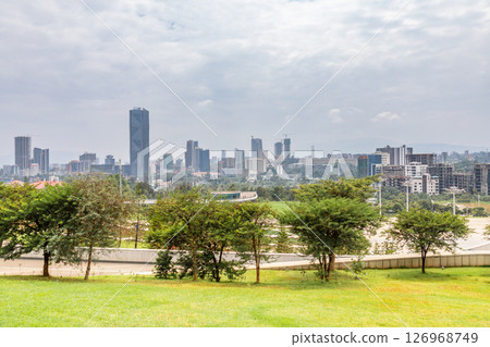 Modern skyscrapers of developing downtown district of Addis Ababa and green park in the foreground, Ethiopia 126968749
