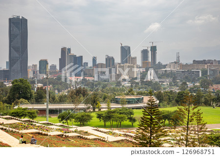 Rapid development of central business district with modern skyscrapers of downtown of Addis Ababa and green park in the foreground, Ethiopia Rapid development of central business district with modern skyscrapers of downtown of Addis Ababa and green park in the foreground, Ethiopia 126968751