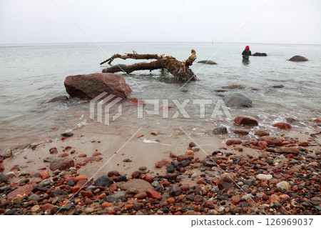 Fisherman Stones in sea water autumn 126969037
