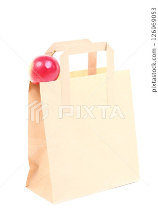 Shopping brown gift bags and apple isolated 126969053