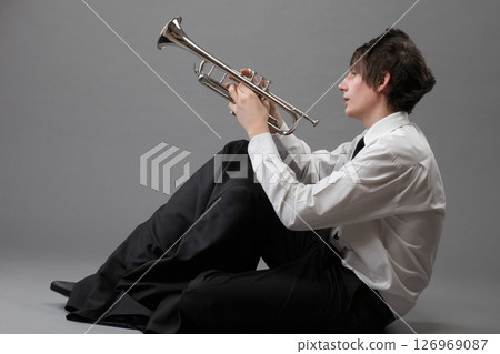 Portrait of a young man and his Trumpet Portrait of a young man and his Trumpet 126969087