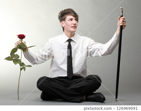 Portrait young man and rose enamoured love Portrait young man and rose enamoured love 126969091