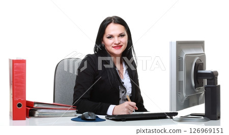 modern business woman sitting at office desk modern business woman sitting at office desk 126969151