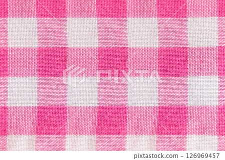 background in a checkered white with pink fabric close up background in a checkered white with pink fabric close up 126969457
