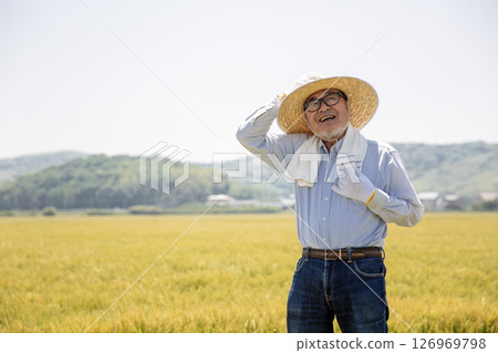 Heat stroke, agriculture, senior Japanese man suffering from heat 126969798