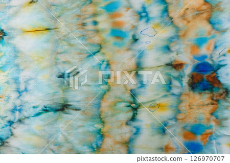 abstract pattern on silk fabric texture in blue, yellow, green colors 126970707