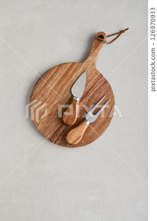 Cheese knife set and circle wooden board with handle 126970933