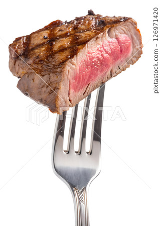 Juicy grilled steak on fork isolated on transparent background, close-up of tender meat, perfect for food ads, recipes, or menus, high-protein meal concept 126971420