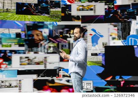 Content creator connecting with a global social media audience through mobile technology, using digital tools for storytelling and branding to build influence, engagement and online presence. 126972346