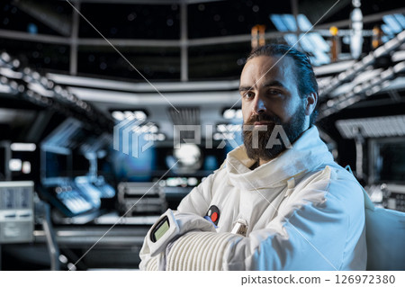 Portrait of cosmonaut testing gear during routine equipment check inside space station. Astronaut in spacecraft powered by advanced engineering running diagnostics to confirm suit integrity 126972380