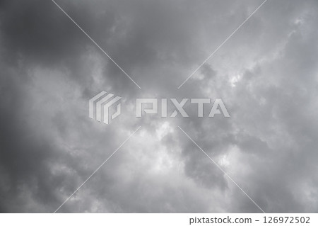 Rain cloud in the sky. Background of dark clouds before thunder storm and rain. Abstract dramatic clouds sky. Rain cloud in the sky. Background of dark clouds before thunder storm and rain. Abstract dramatic clouds sky. 126972502