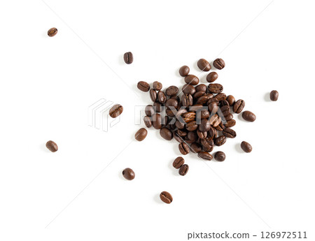 Brown roasted coffee beans seeds. Isolated of coffee bean on white background. Close up image. Brown roasted coffee beans seeds. Isolated of coffee bean on white background. Close up image. 126972511