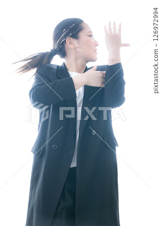 A woman in a dynamic dance motion: A cool sports image A woman in a dynamic dance motion: A cool sports image 126972994