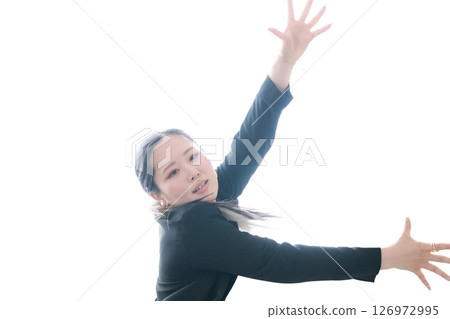 A woman in a dynamic dance motion: A cool sports image 126972995