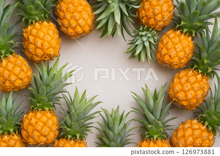 Fresh pineapple pile with water drops top view 126973881