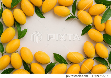 Fresh maprang fruit pile with water drops top view 126973883