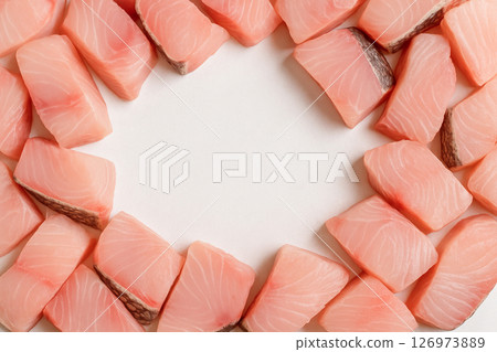 Fresh raw barramundi fish fillets top view white Fresh raw barramundi fish fillets top view white 126973889