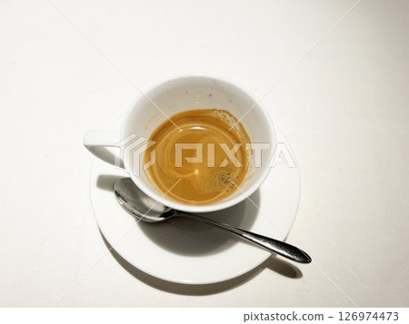 Espresso on a white table Espresso on a white table 126974473