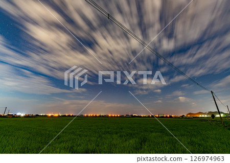 Starry sky and fields at night 126974963