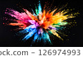 Colorful powder paints explode in a vibrant burst against a black background. 126974993