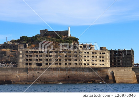 Gunkanjima (Hashima) Reinforced concrete houses on the southwest side, view of Hizen Hashima Lighthouse Gunkanjima (Hashima) Reinforced concrete houses on the southwest side, view of Hizen Hashima Lighthouse 126976046