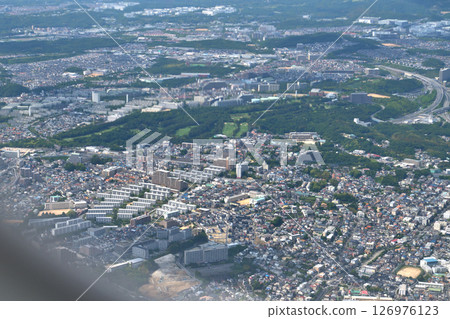 View from the plane: Descending altitude to Kobe Airport, above Tarumi Ward, Kobe City 126976123