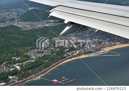 View from the plane: Descending to Kobe Airport, over Suma Beach 126976125