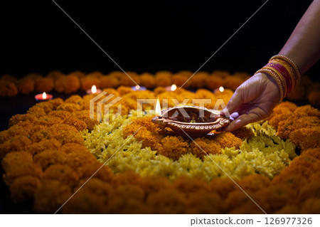 Diwali Traditions and Celebrations Around the World. 126977326