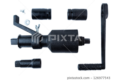 Disassembled manual impact wrench tool kit with handle, sockets, fasteners, and drive mechanism on white background Disassembled manual impact wrench tool kit with handle, sockets, fasteners, and drive mechanism on white background 126977543