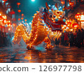 A dazzling dragon dance lights up the Chinese New Year night, symbolizing strength, prosperity, and celebration. Lanterns glow as the streets come alive with vibrant energy and cultural tradition. 126977798