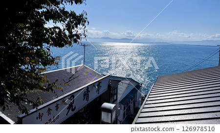 Fireworks display over Yokohama Port during a lively festival celebration at night 126978510