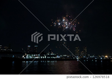 Fireworks display over Yokohama Port during a lively festival celebration at night Fireworks display over Yokohama Port during a lively festival celebration at night 126978518