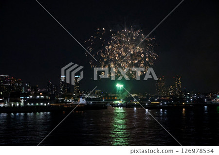 Fireworks display over Yokohama Port during a lively festival celebration at night Fireworks display over Yokohama Port during a lively festival celebration at night 126978534