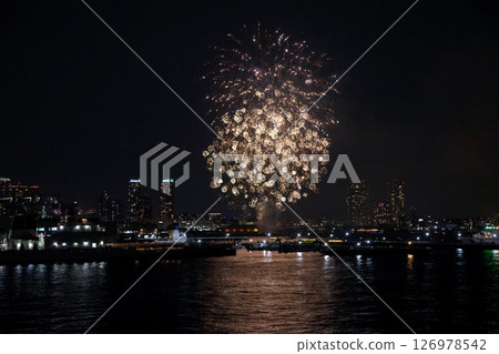 Fireworks display over Yokohama Port during a lively festival celebration at night 126978542